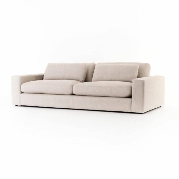 Close-up of Blaine Sofa showcasing plush cushions in natural fabric upholstery, ideal for comfort.