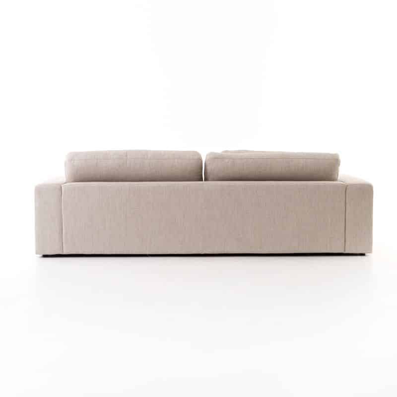 A beige upholstered sofa with a back cushion made from 100 feather fiber blend and seat cushion composed of 62 foam 19