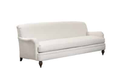 Amelia English arm sofa in alabaster with dark brown legs.
