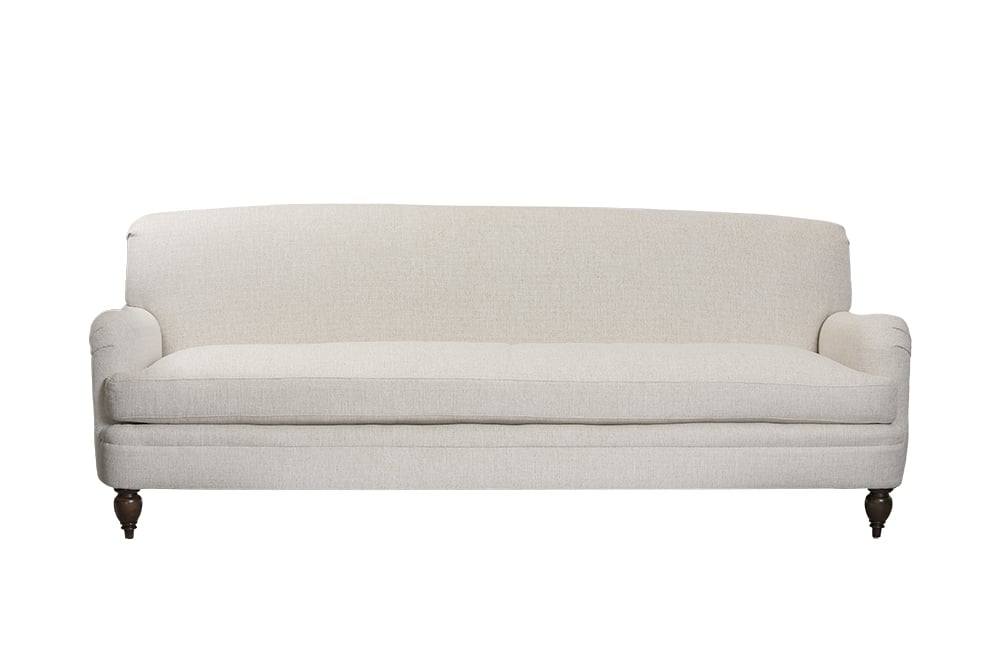 Amelia English Arm Sofa in Alabaster with dark brown legs and tight back cushions.