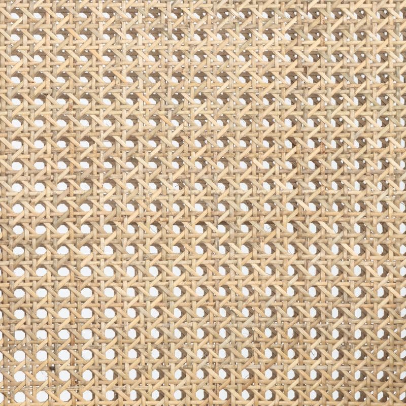 Close-up image of a Cane Counter Stool with neutral linen blend seat and backrest made from wicker.