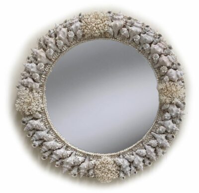 Hand-crafted round mirror encrusted with a variety of shells.