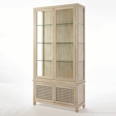 Tall lattice white washed driftwood cabinet with glass shelves and lower closed storage.