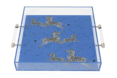 Bright blue lucite tray with zebra motif and handles.