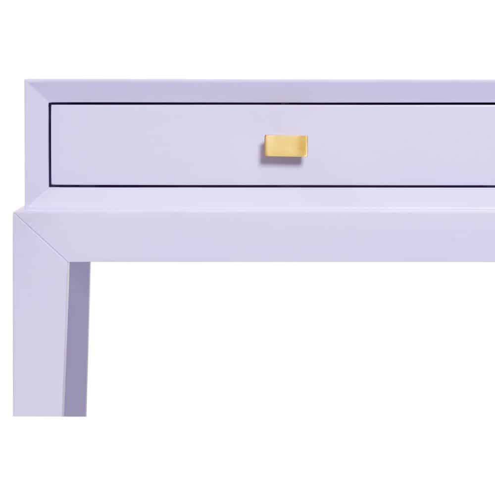Purple desk with beveled edges and lace gold hardware.