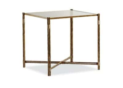 Close-up of a Werner side table with bamboo motif and glass top in bronze finish.