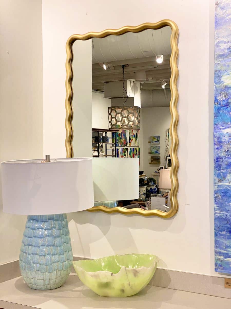 Small, rectangular scalloped mirror in antique gold leaf art nouveau design.