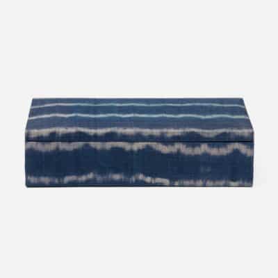 Blue tie-dye box with shiny abaca material and light rattan lining, photographed from a side angle.
