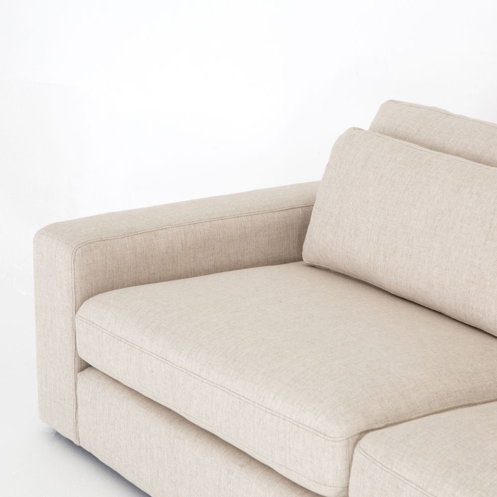 Blaine sectional sofa, beige fabric, 5 pieces, L-shaped configuration with floating ottoman, available in left or right arm facing.