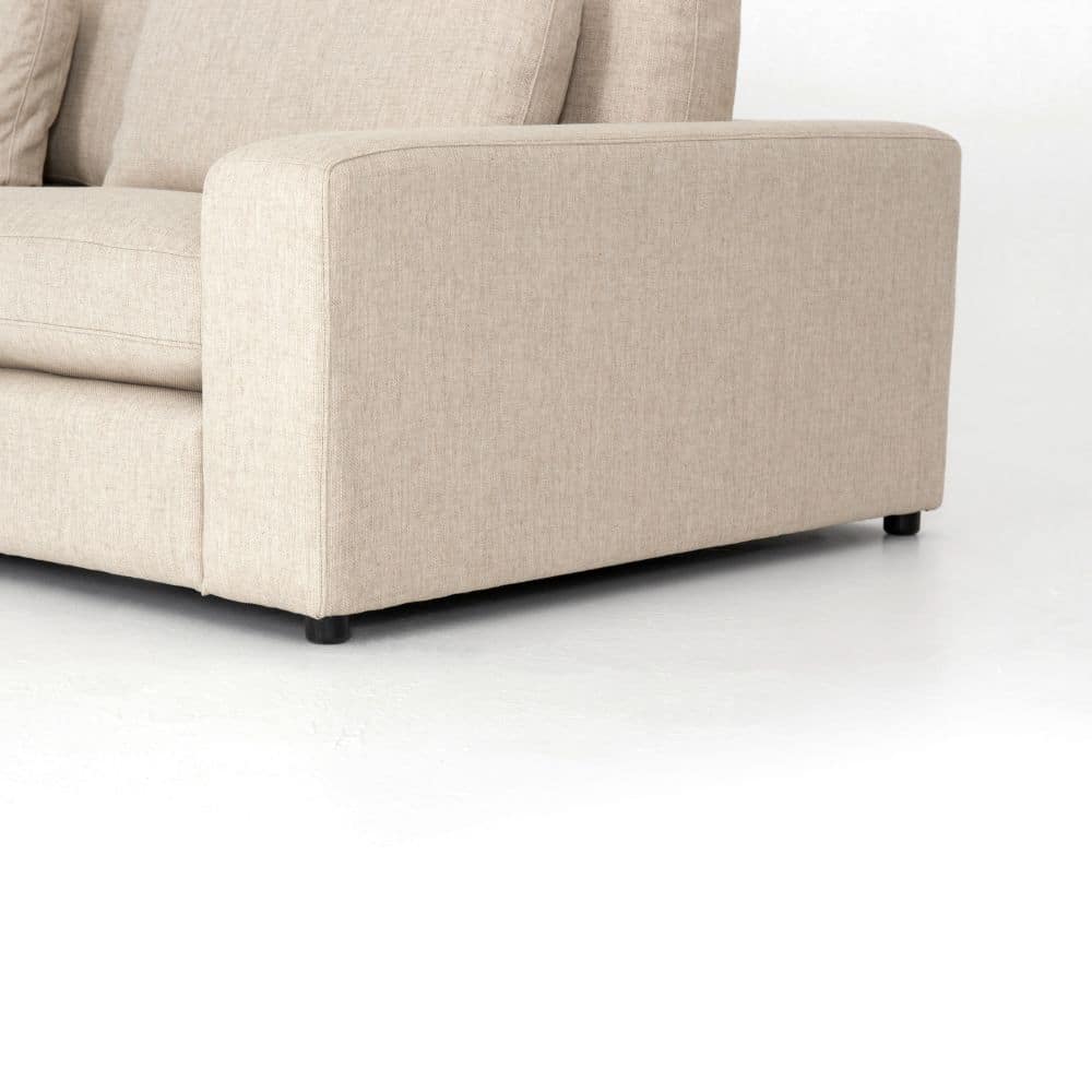 Close-up of a Blaine 5 Piece Sectional Sofa in natural fabric featuring feather fiber blend back cushions and foam fiber down seat