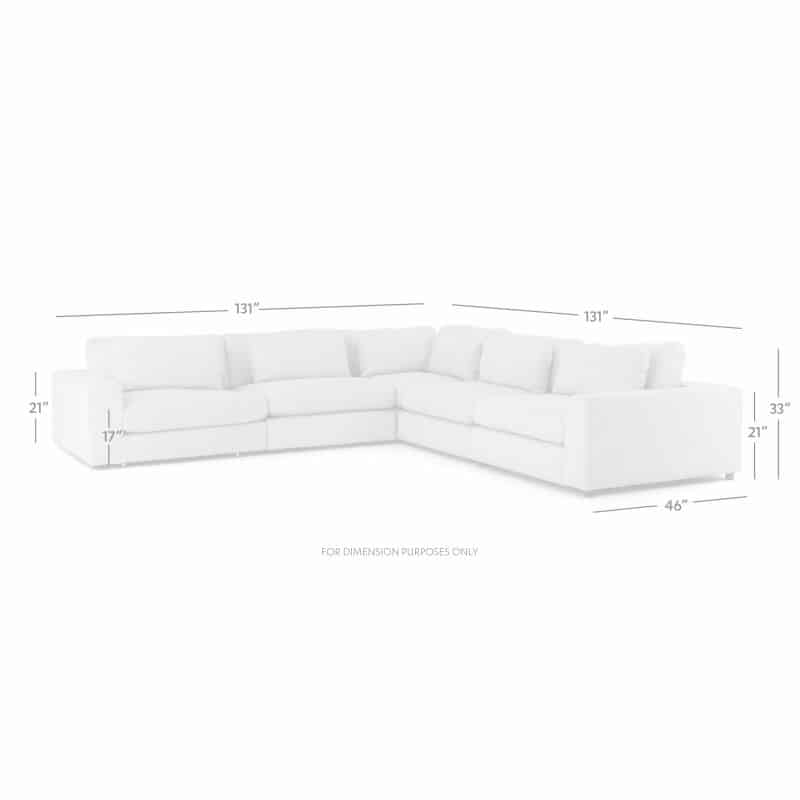 A white, five-piece sectional sofa with a feather fiber blend back cushion and available floating ottoman for upcharge.