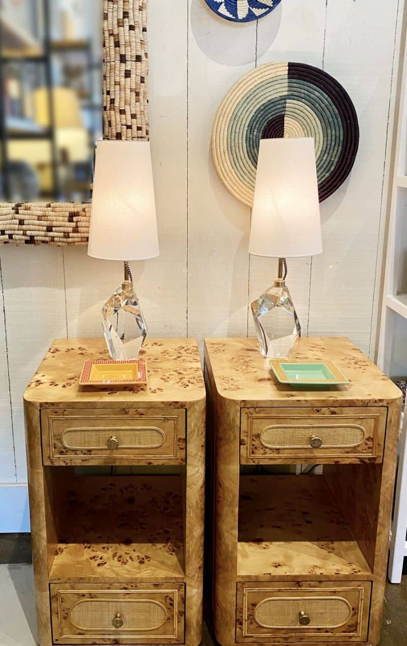 Small mappa burl nightstand with matte raffia finish and textured golden knobs.
