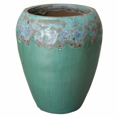 Large blue ceramic urn with intricate glaze pattern, showcasing a handcrafted finish with variations in texture and subtle imperfections.