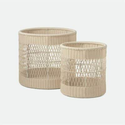 Two wicker baskets with lattice weave design available in off white chestnut or graywashed finish for outdoor use 25 5 D x