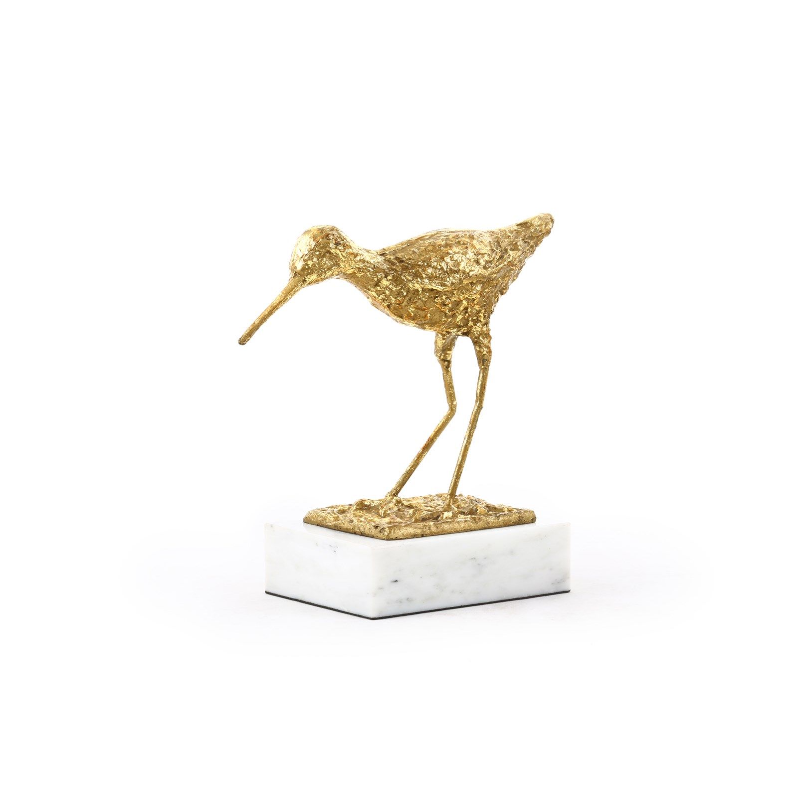A miniature gold sculpture of a bird perched on a marble base, capturing attention with its detailed design.