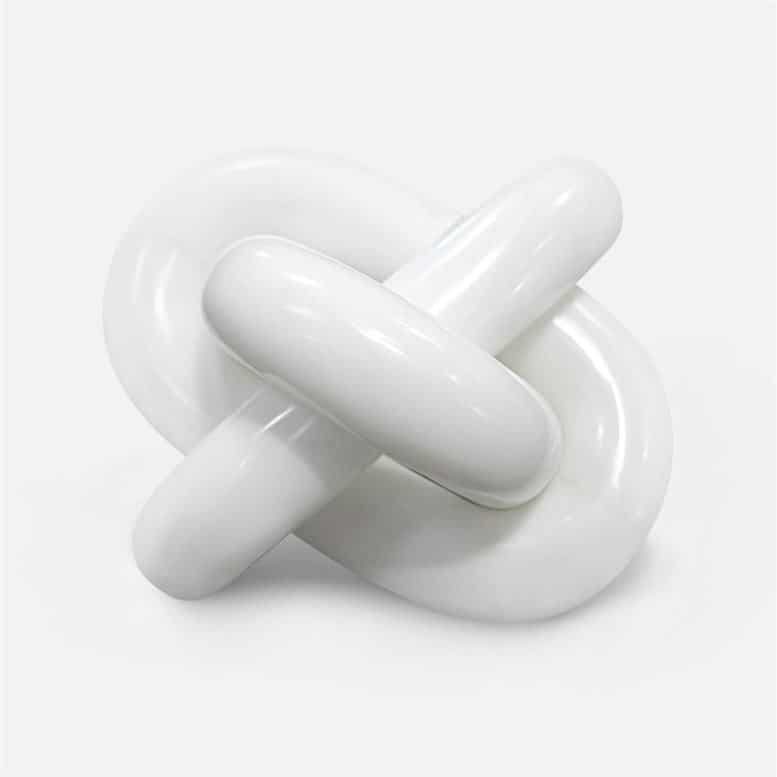 Tallis Object, white stone knot, ceramic design, smooth surface, contemporary accessory.