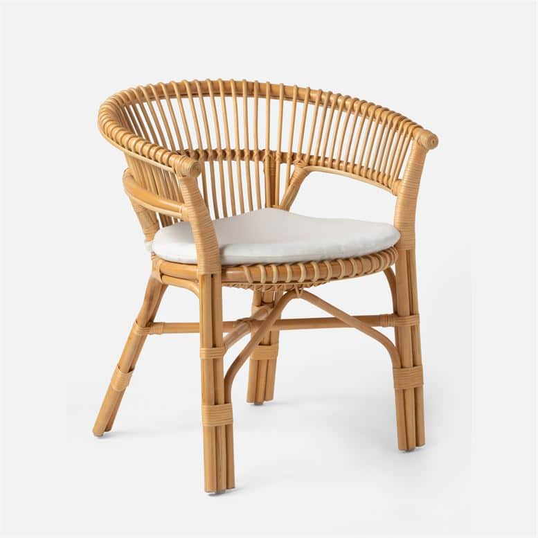 Bamboo-framed woven rattan dining chair with a barrel back, featuring flared arms and a round seat cushion.