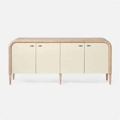 Beige wooden buffet with a curved front and three doors each featuring two handles It has a vintage faux shagreen top with