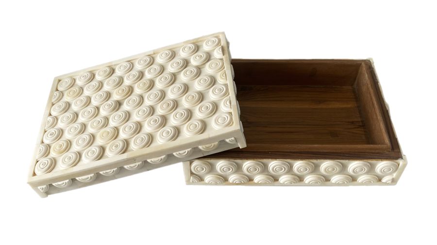 The image shows two rectangular bone boxes with a grommet design one larger and the other smaller placed next to each other