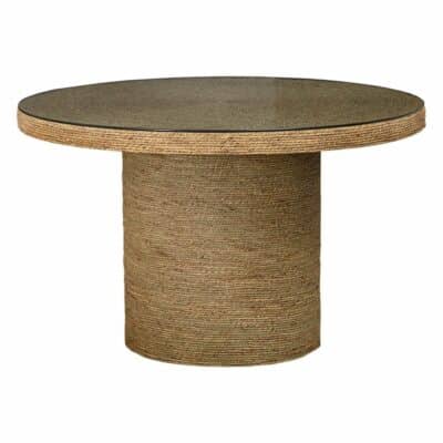 Round wicker table with glass top, featuring natural tones and polished edges.