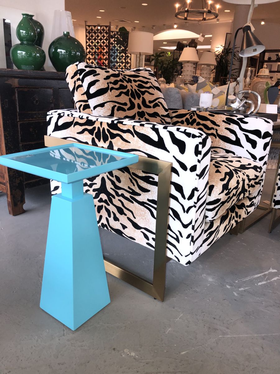 A customizable drink side table from Bacchus featuring a glass inset top and available in any Benjamin Moore paint color and sheen