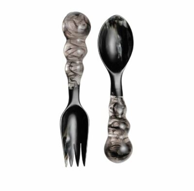 Curvy resin and horn servers in various colors, showcasing unique design and craftsmanship.