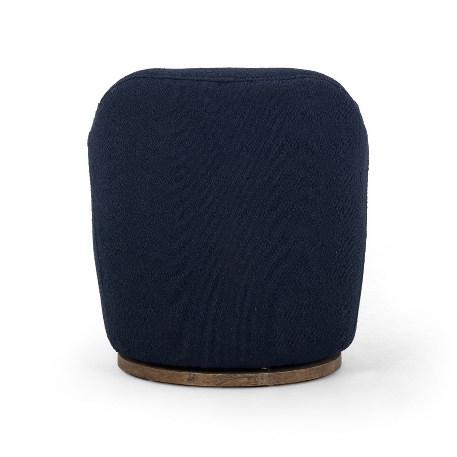 A blue upholstered chair with a round natural wood base and legs It features a simple design with a modern look The