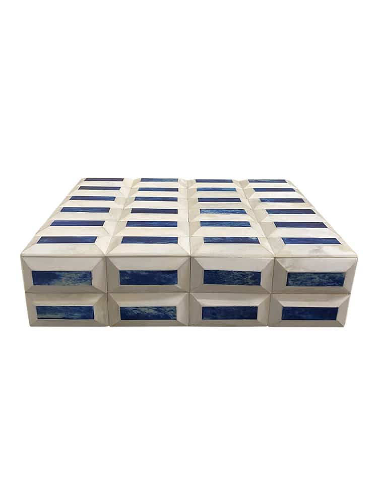 Blue and Ivory Cloud Boxes set on white surface, featuring geometric pattern in blue and ivory color scheme.