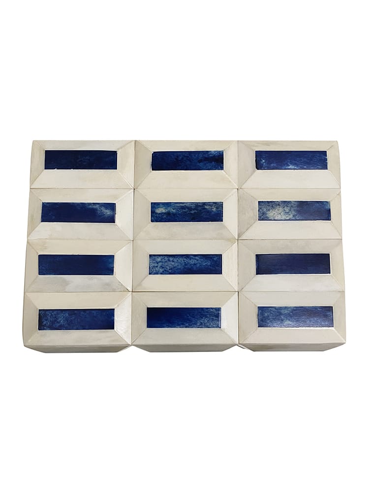 Large blue and ivory box set featuring four rectangular boxes in a 2x2 grid arrangement each box showcasing unique shades of blue