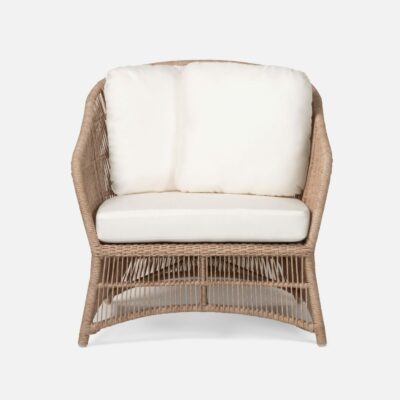 Outdoor Faux Wicker Lounge Chair with white cushions, showcasing woven texture and performance fabric upholstery.