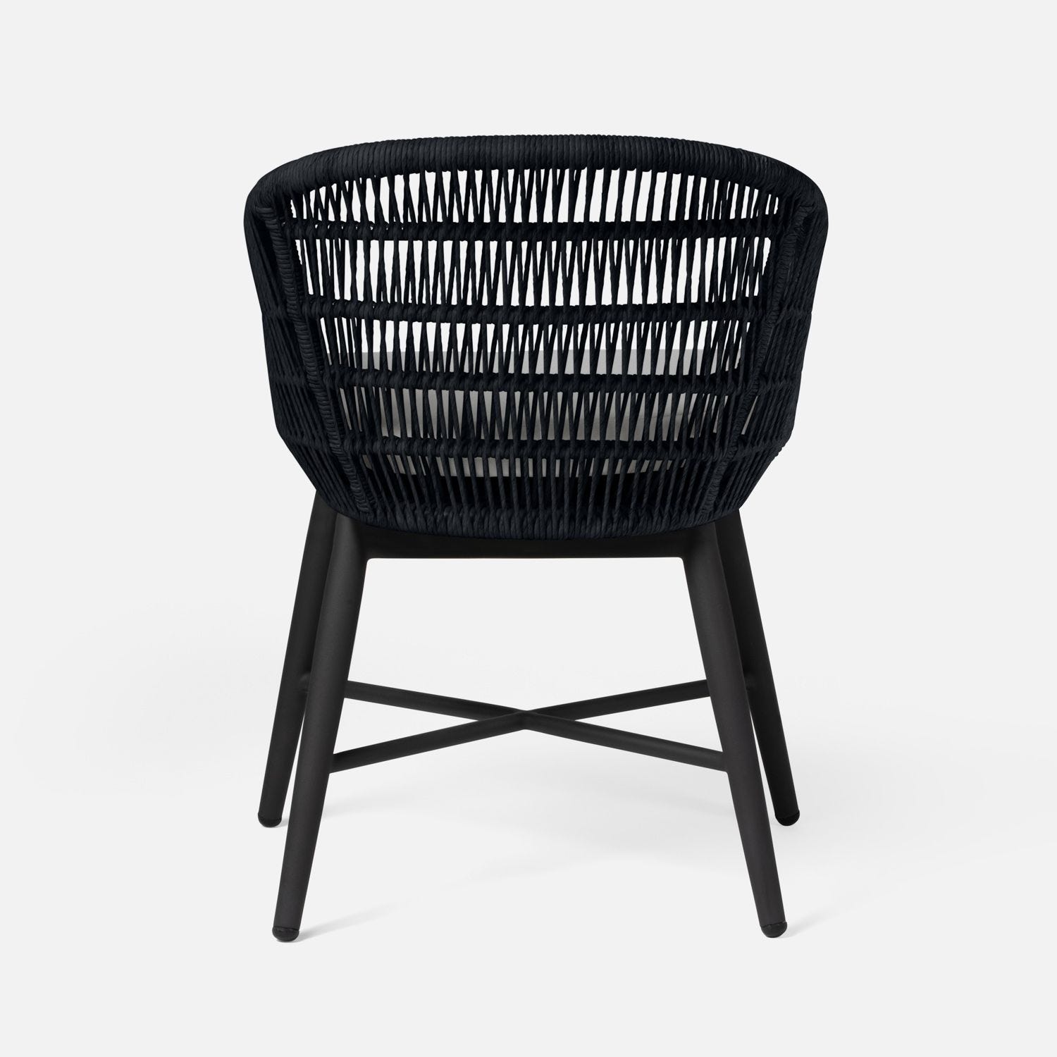 Sleek modern outdoor dining chair with a woven rope texture in dark navy or slate set against a stark white background for