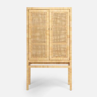 A peeled rattan standing cabinet featuring two fixed wooden interior shelves, finished with wood and adorned with a flower patterned gold knob.