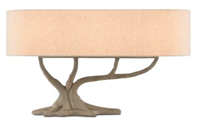 A large faux bois concrete table lamp in a bonsai tree style featuring a natural linen shade with visible hairline cracks and
