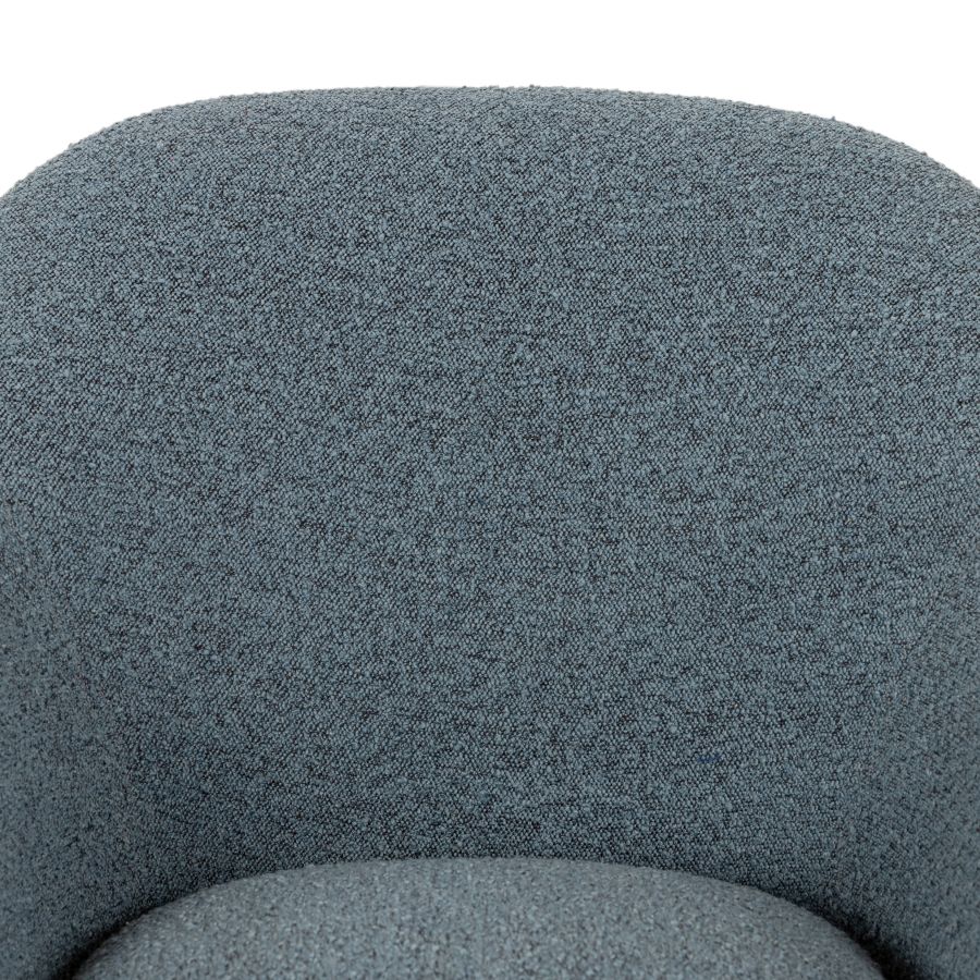 A stylish blue upholstered mid-century style chair with a modern black iron base.