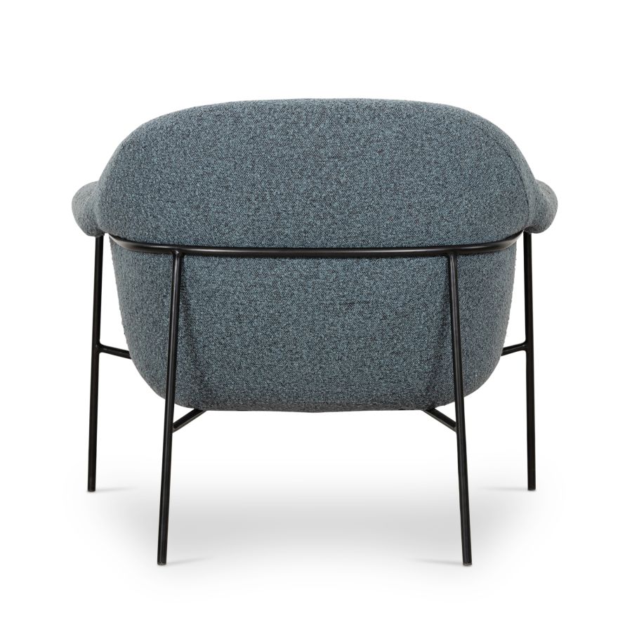 A blue upholstered mid-century style armless chair with a black metal base.