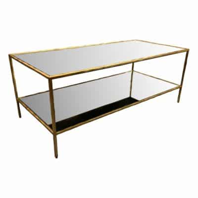 A sleek, rectangular coffee table with a mirrored top and bottom shelf, available in both rectangular and square designs.