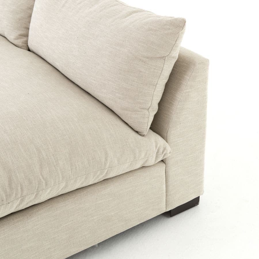 Modern armless sectional sofa in high performance fabric, available in natural oatmeal or charcoal velvet.