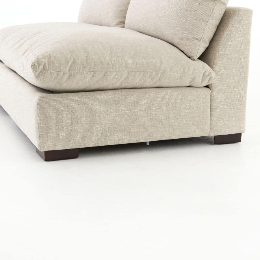 This is an image of a Vice Modern Armless 3 Piece Sectional sofa upholstered in high performance fabric with espresso legs available