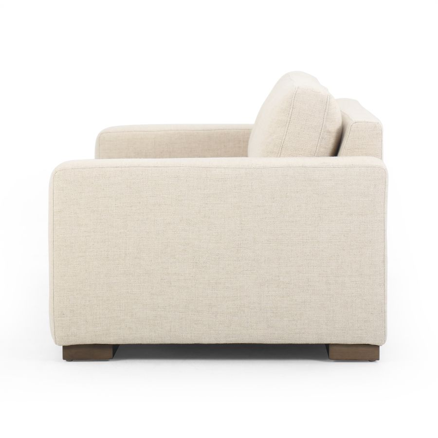 Modern, stylish sofa with a beige upholstery and wooden base, available in two colors: cream or coal.