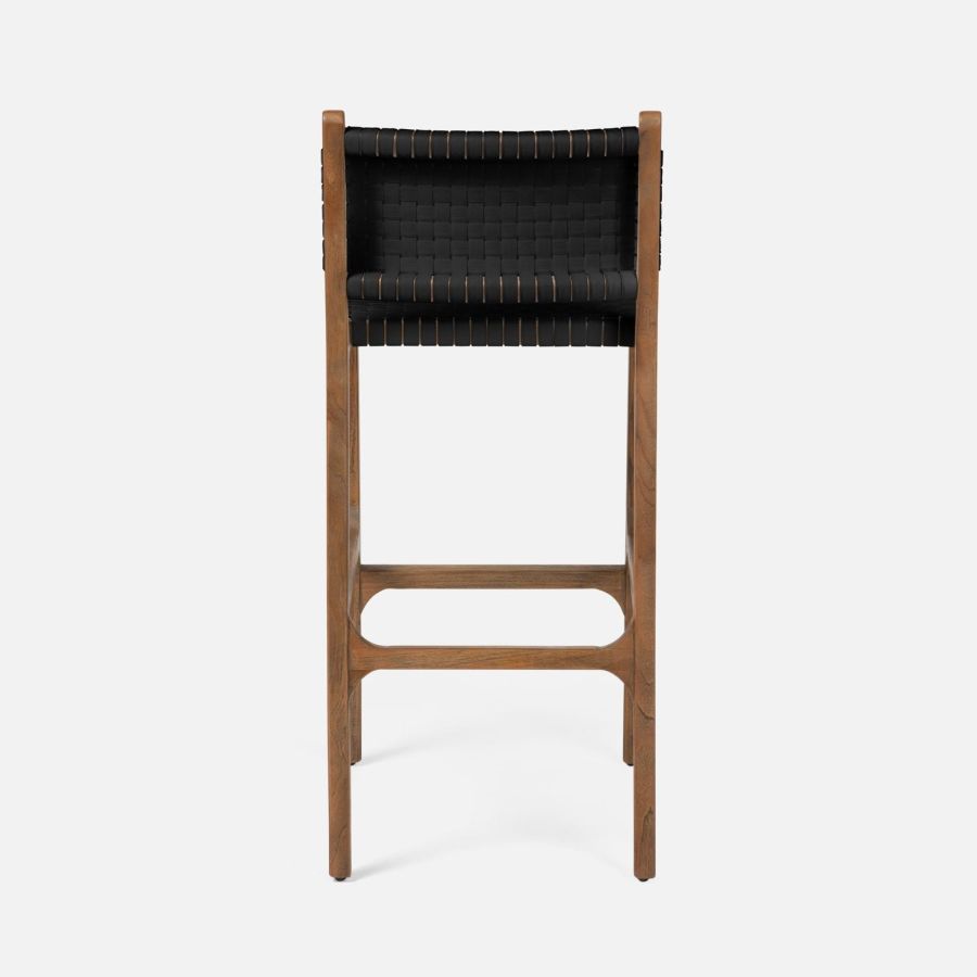 Close-up of Hammond Faux Rattan Bar Stool, showcasing detailed wicker design and sturdy wooden frame in flat black finish.