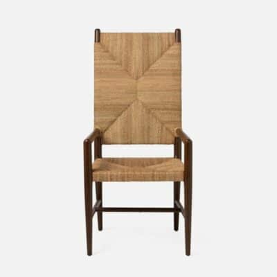 High back woven dining armchair, featuring a striking zigzag pattern on its backrest.