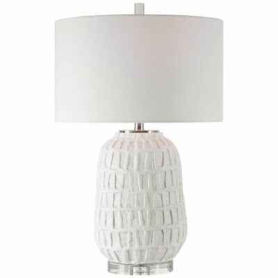 Textured white ceramic lamp with organic grid design, thick crystal foot, polished nickel accent, and white linen drum shade.