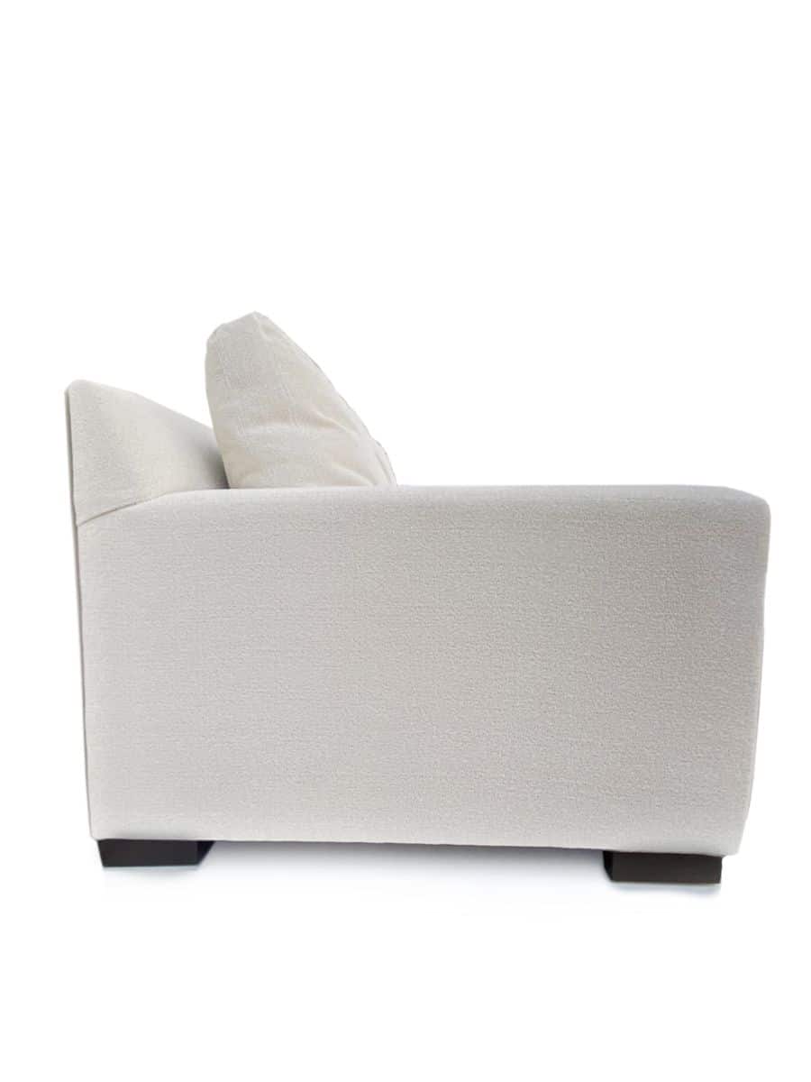 Front view of Brentwood sofa upholstered in ivory Crypton, featuring a simple tuxedo frame and two over two cushions.