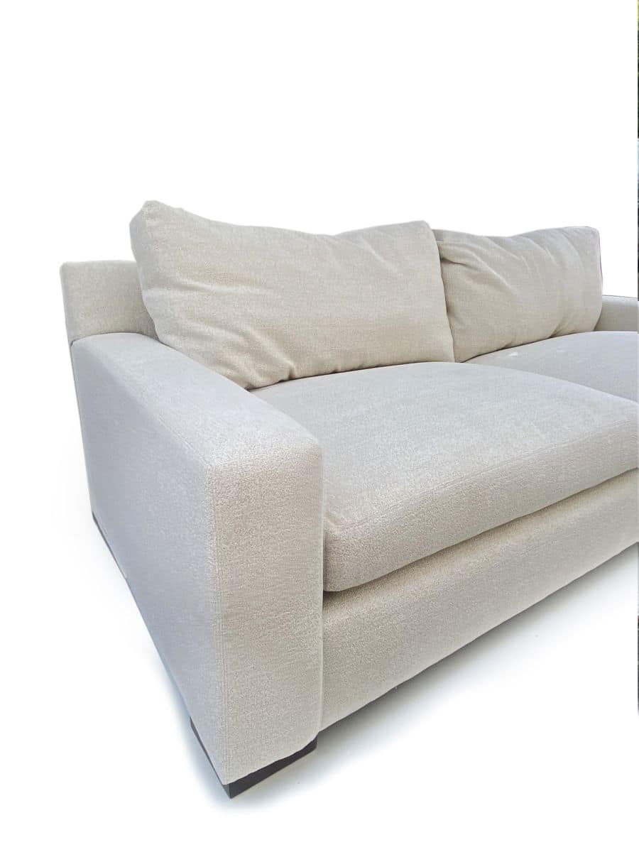 Ivory Crypton upholstered Brentwood sofa, plush cushions and clean lines.