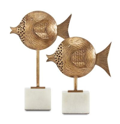 Two brass fish sculptures on marble stands.