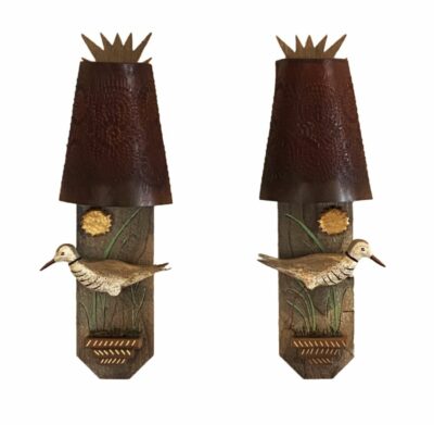 Handmade piper and sun sconces with knotty pine birds, walnut finish.