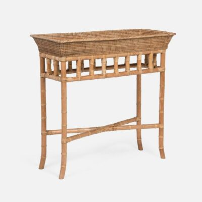 A sleek rattan console with a tray top and bamboo base in a natural finish.