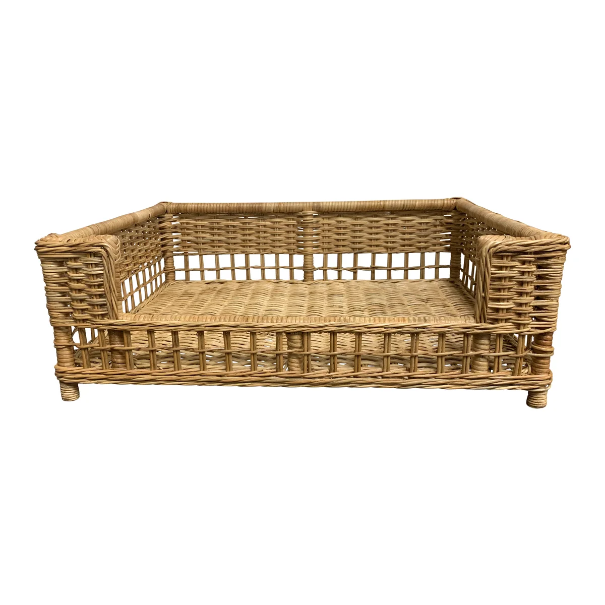 Close-up of a chestnut-colored Vineyard Dog Bed, crafted from natural materials.