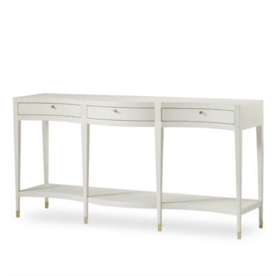 Elegant ivory faux shagreen console table, showcasing serpentine front design and brass hardware.