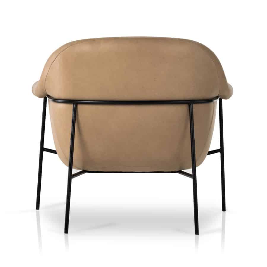 Butterscotch leather chair with mid-century style and black iron base, available in Boucle.